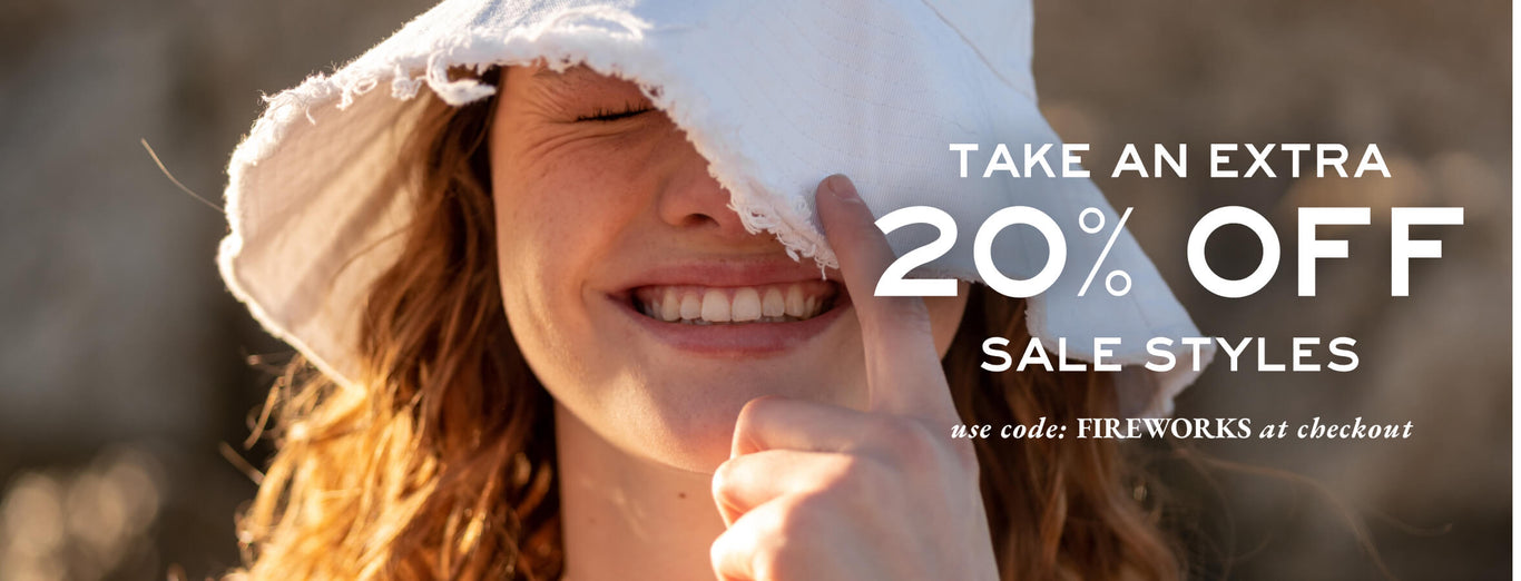 take an extra 20% off sale styles use code: FIREWORKS at checkout - female wearing white bucket hat