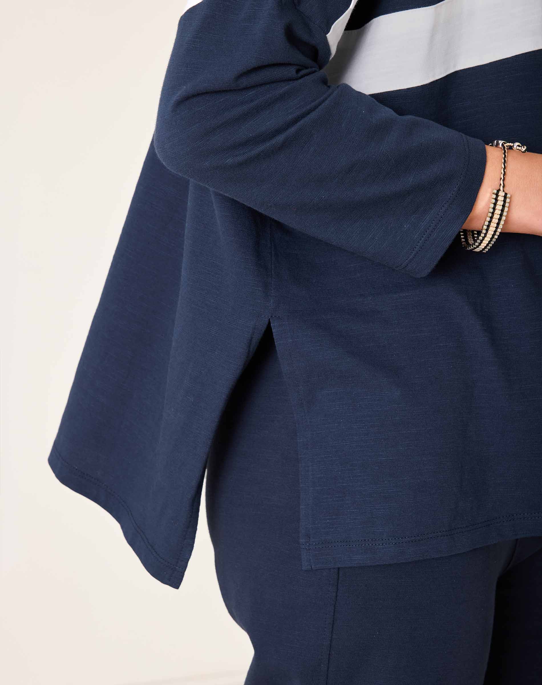 Navy blue outfit with a white background
