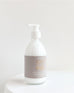 saltaire shea lotion laying on a white background