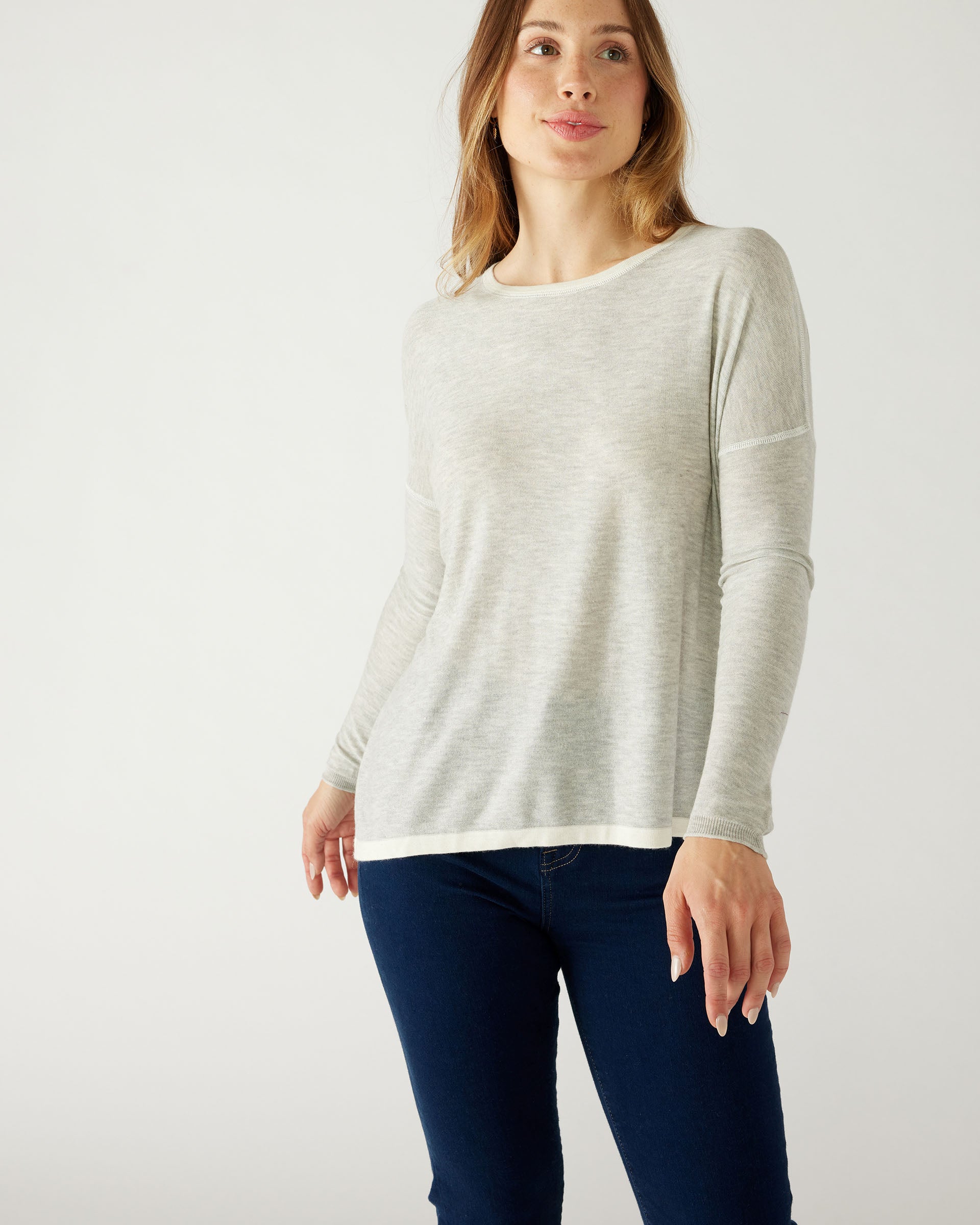 woman wearing mersea saltwash sweater in grey