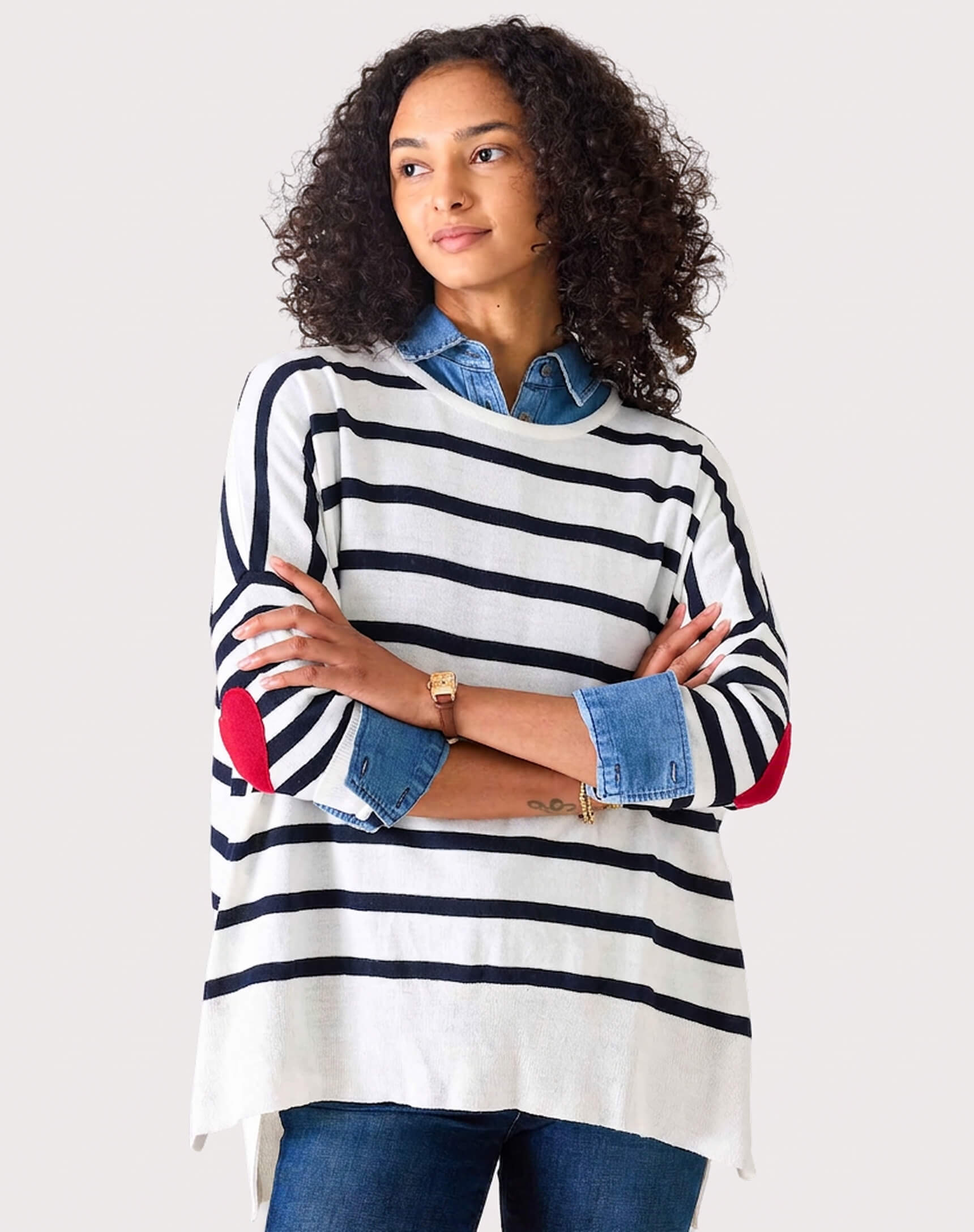 MERSEA women's travel-friendly navy and white striped knit tunic with red and blue accents over a denim button-down shirt.
