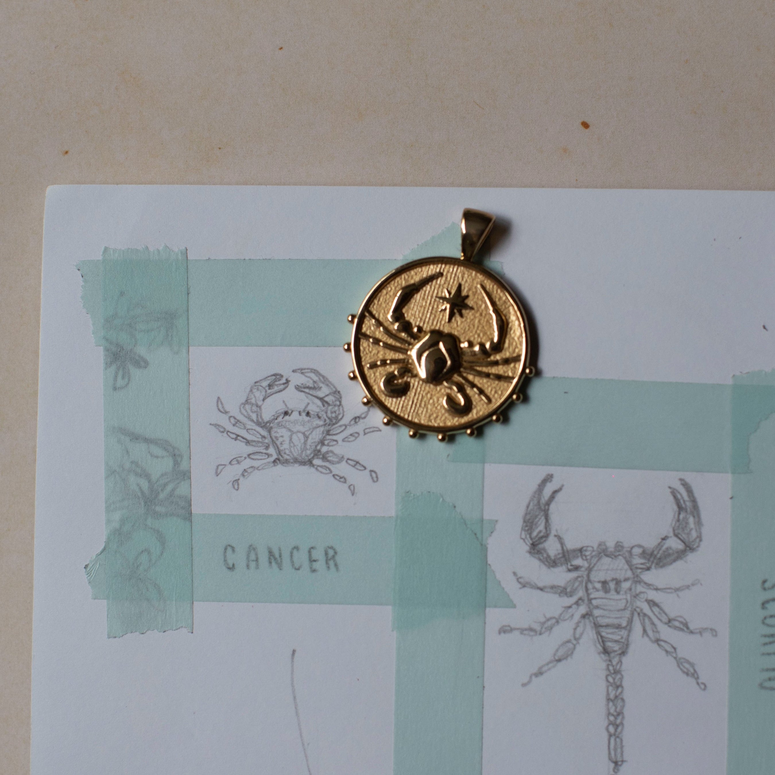 mersea colab cancer zodiac pendant on drawings