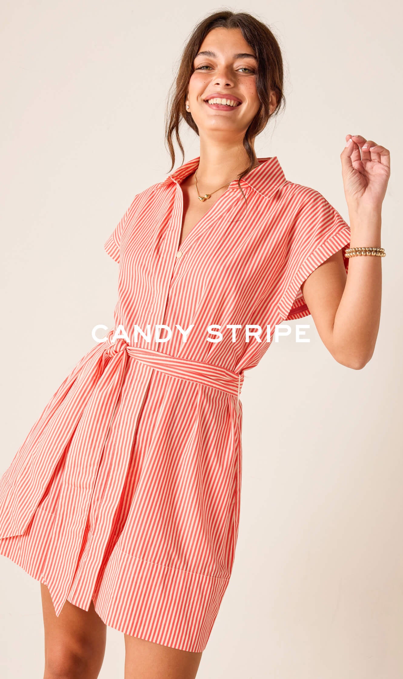 Candy stripe dress featuring a shirt-style bodice and a belted waist. Text: CANDY STRIPE