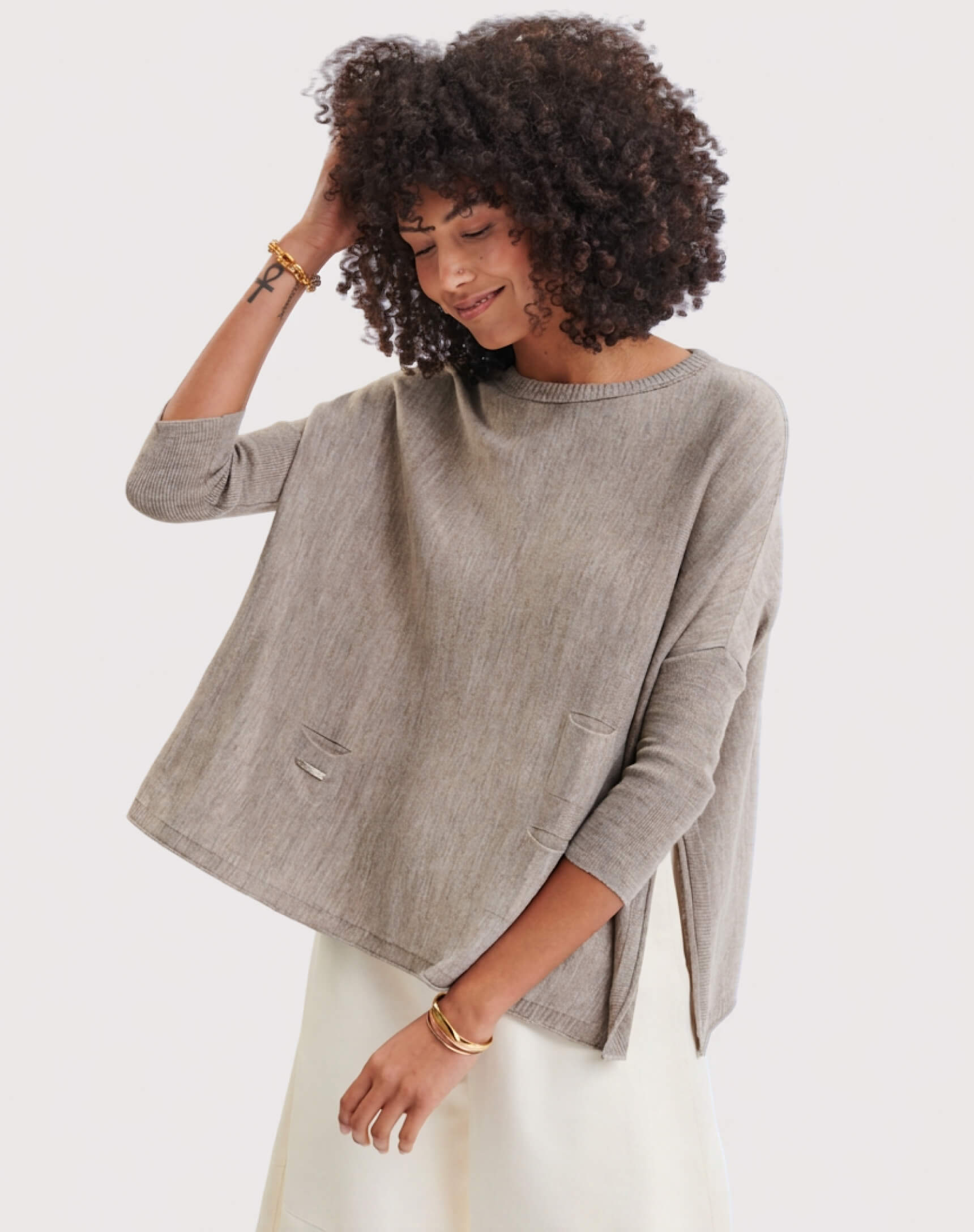 MERSEA ladies' travel-ready oatmeal heather knit oversized tunic with elbow-length sleeves and distressed details