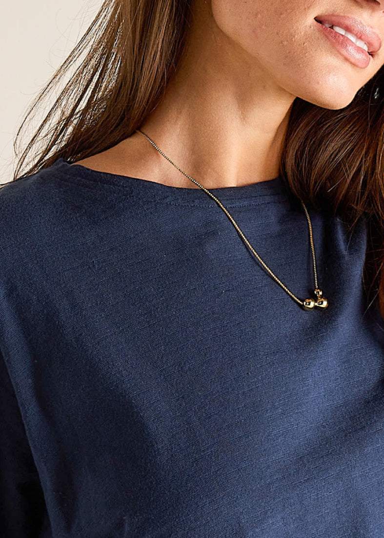 MERSEA ladies' travel-ready navy blue crewneck jersey tee.