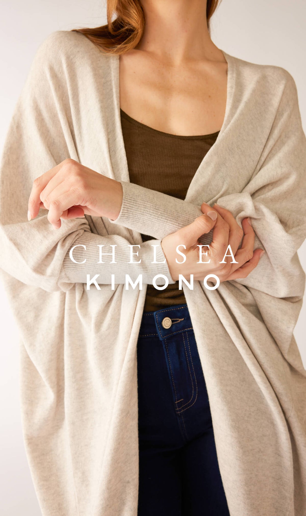 MERSEA women's travel-friendly oversized cream knit kimono with wide sleeves.