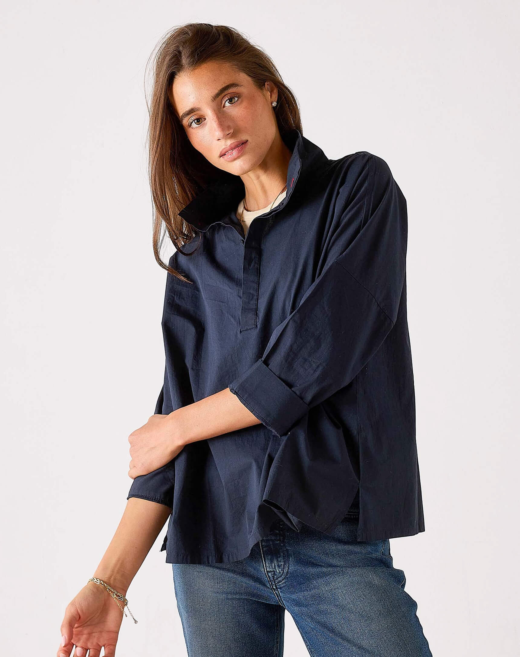 MERSEA ladies' travel-ready navy blue oversized button-down linen shirt with a structured collar and rolled sleeves.