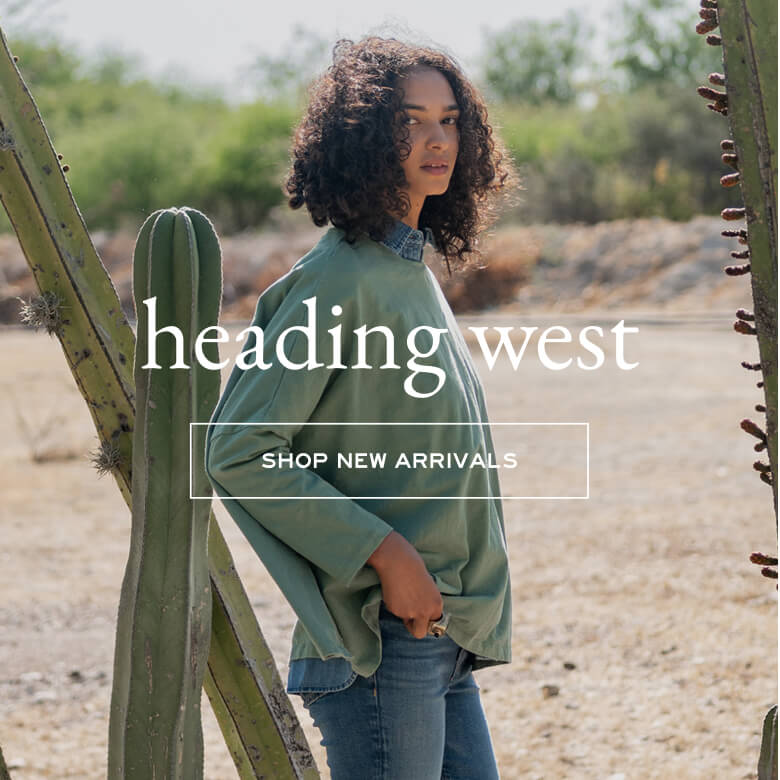 Person standing next to a cactus with 'heading west' text overlay