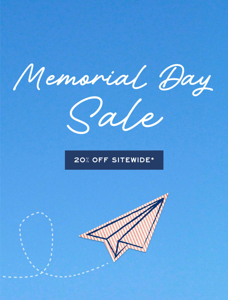 Memorial Day Sale advertisement with a paper airplane on a blue background
