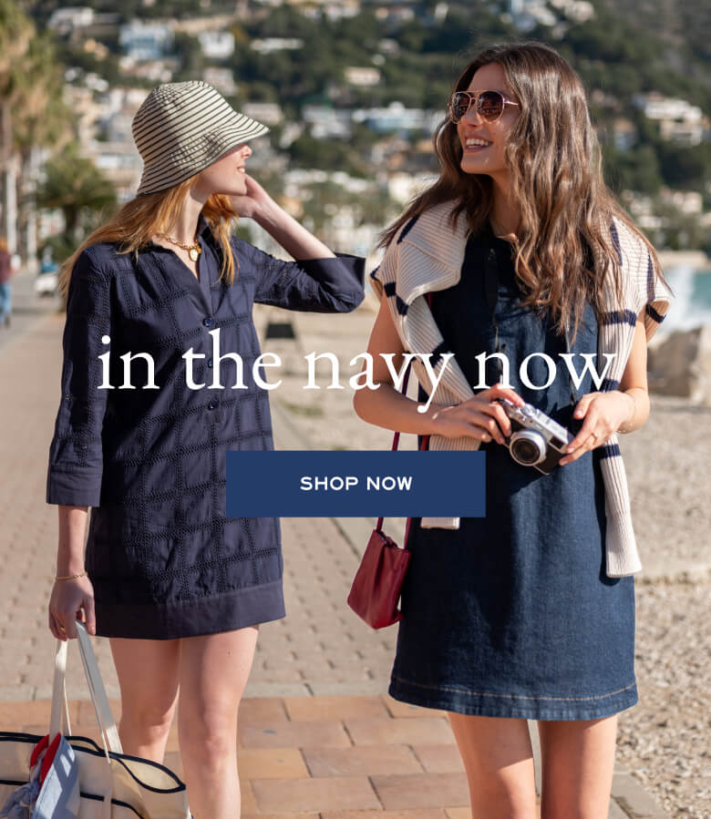 Navy blue oversized tunic with large pockets and a woman in a denim dress wearing a patterned wrap.