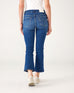 lower body rear view of Woman wearing Mersea Infinity blue Nomad cropped mini boot-cut jeans standing on white background