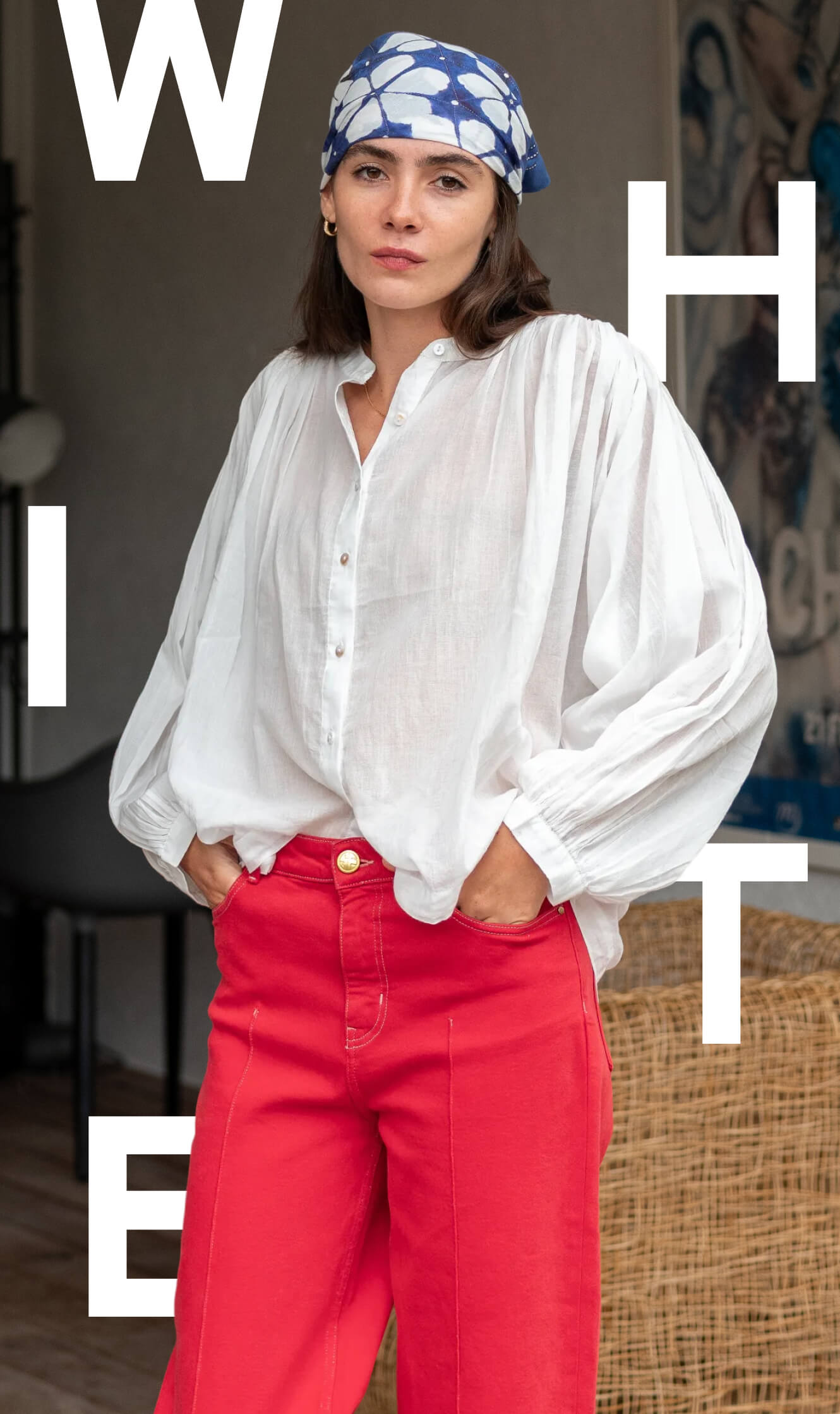 Image of a woman wearing a white flowy top.