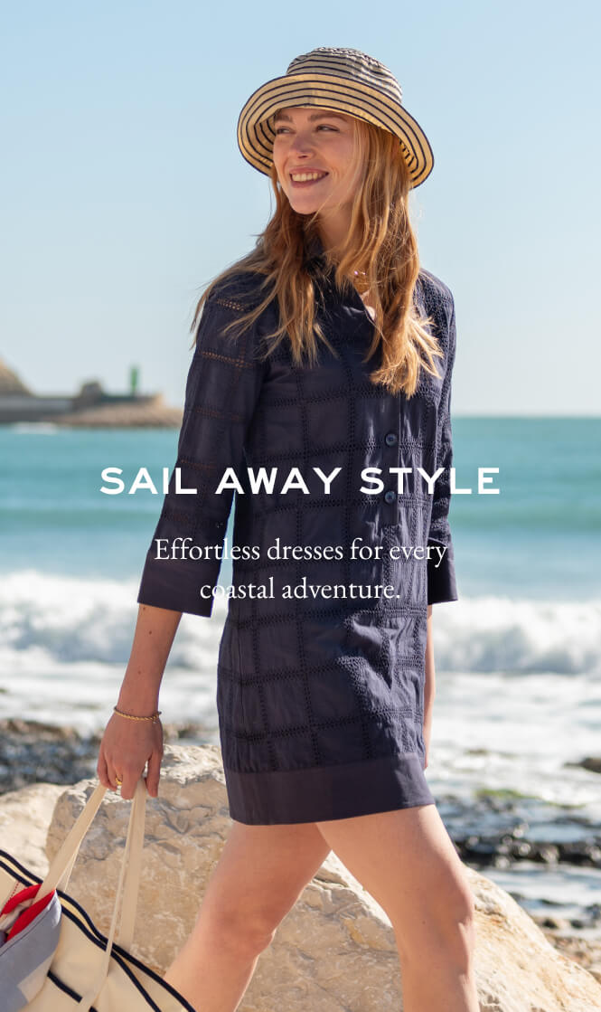 Navy blue textured knit midi dress. Text: SAIL AWAY STYLE Effortless dresses for every coastal adventure.