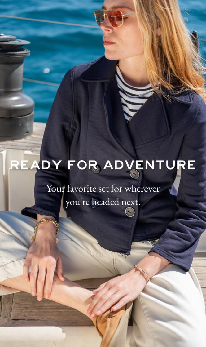 Navy knit button-up cardigan over a striped tee and cream pants. Text: READY FOR ADVENTURE Your favorite set for wherever you're headed next.