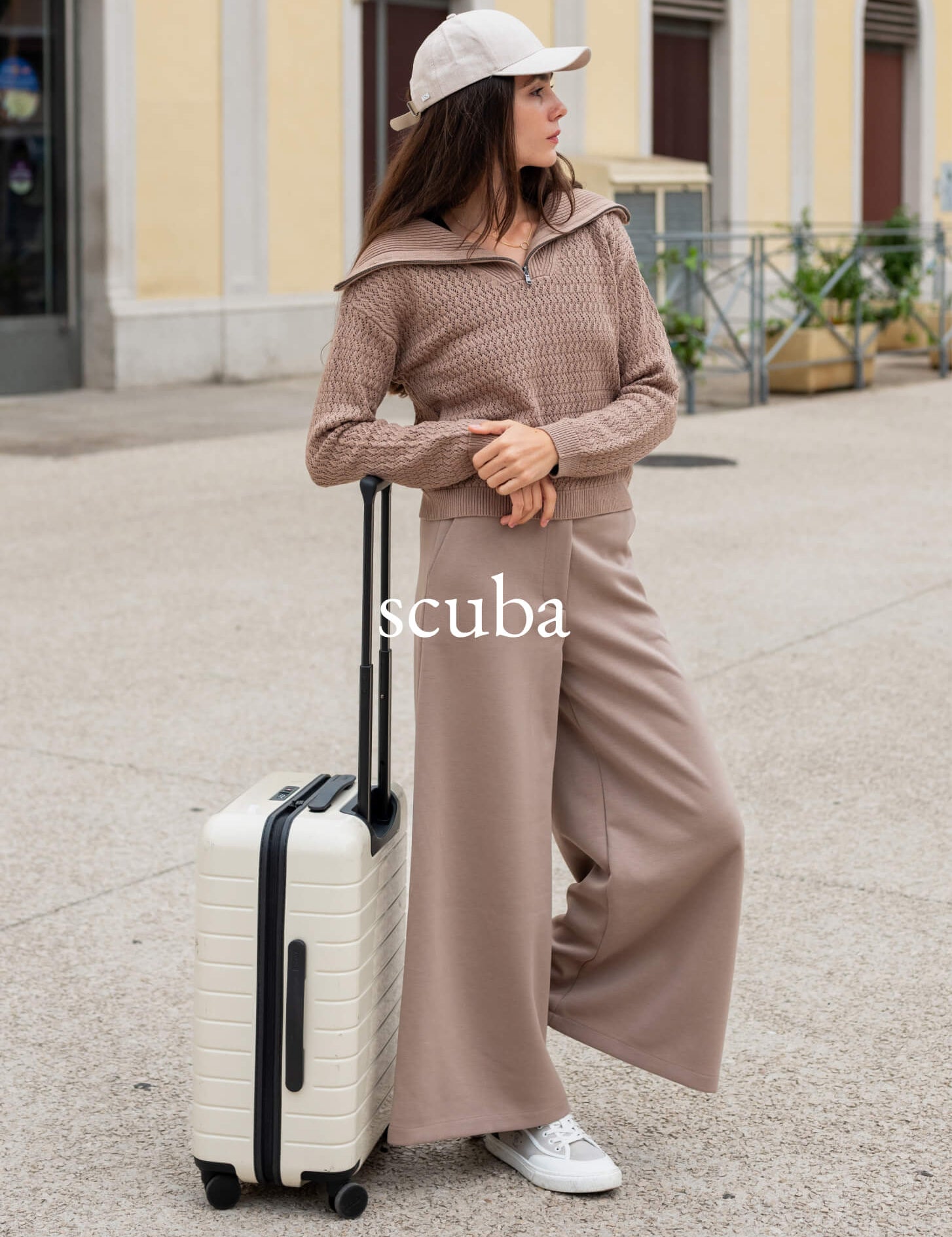 Scuba - Image of a woman wearing a light brown scuba travel sets