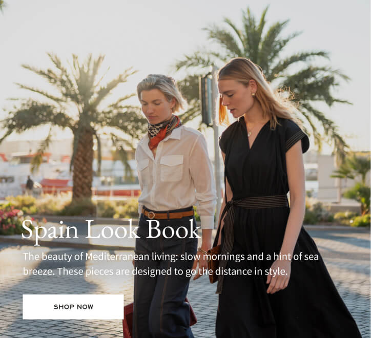 Spain Look Book banner. Text: 'Spain Look Book. The beauty of Mediterranean living: slow mornings and a hint of sea breeze. These pieces are designed to go the distance in style. SHOP NOW'