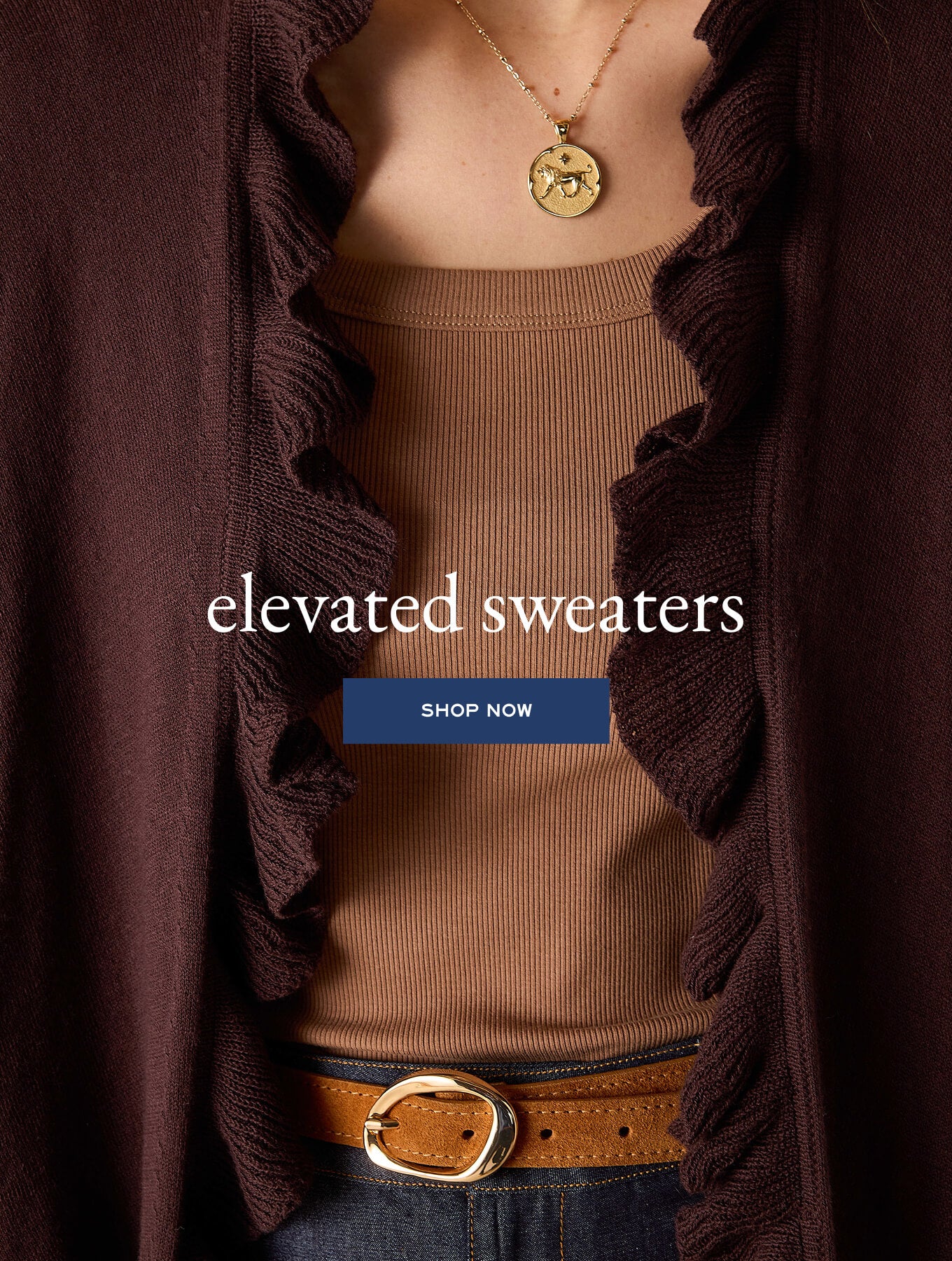 Rust brown knit sweater over a tan ribbed top. Text: elevated sweaters SHOP NOW
