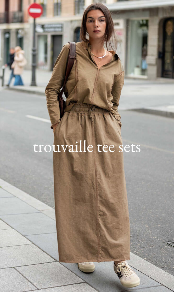 Mustard yellow linen-blend matching tee and maxi skirt set with a front-zip top and gathered waist. Text: trouvaille tee sets