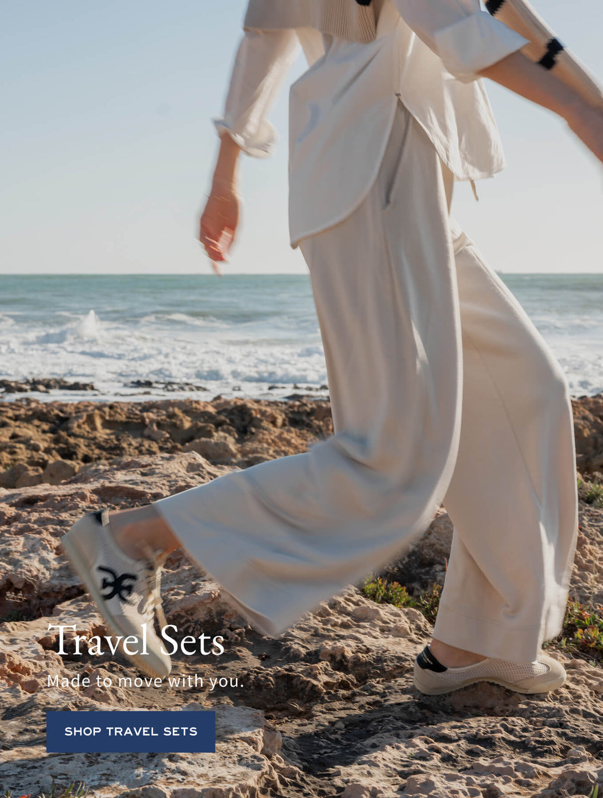 Promotion for travel sets. Text: 'Travel Sets. Made to move with you. SHOP TRAVEL SETS'