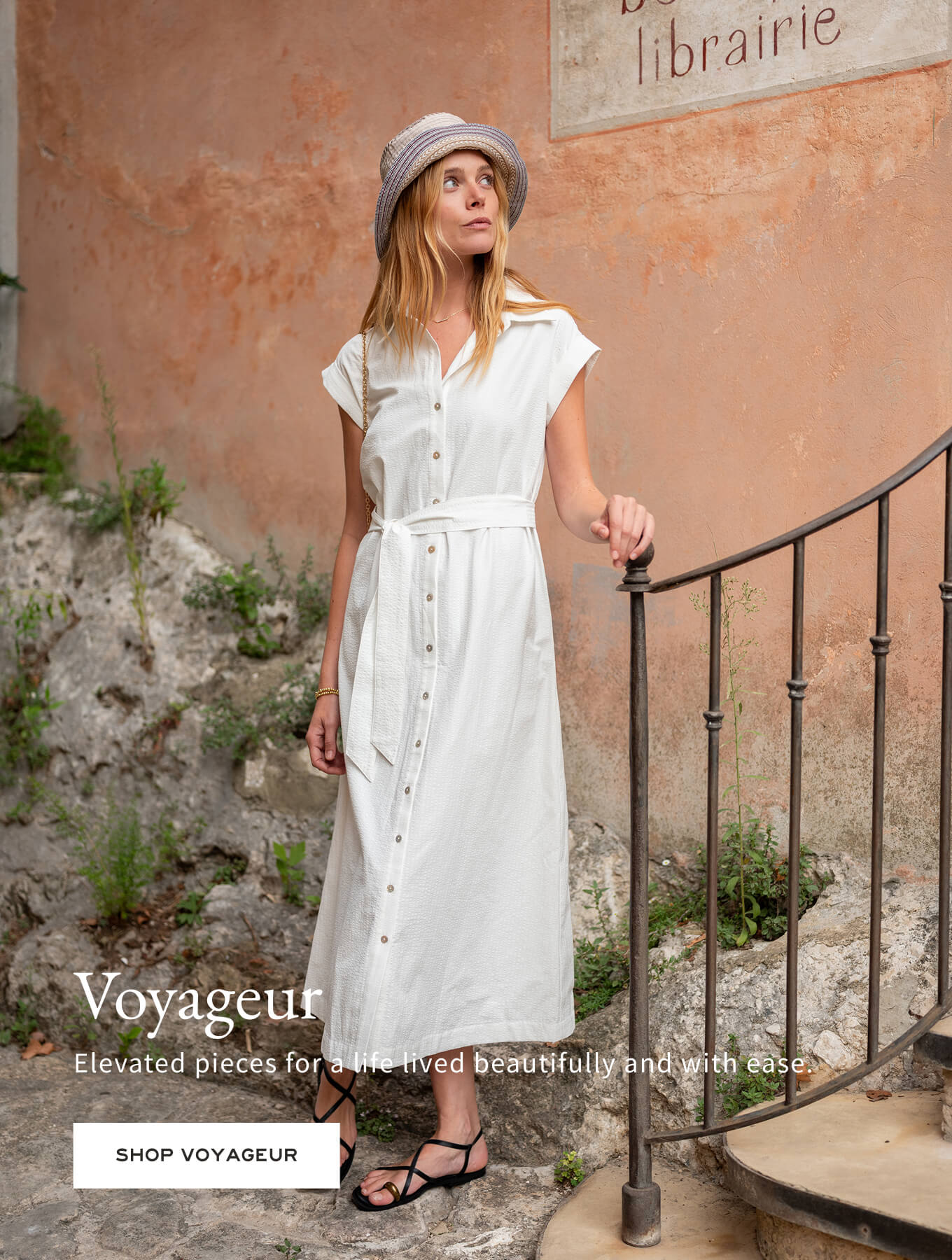 Voyageur - Elevated pieces for a life lived beautifully and with ease. - Shop Voyageur - Image of a woman wearing a white short sleeve dress.