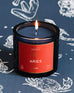Mersea Aries candle against astrology sign background
