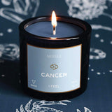 Mersea Cancer candle against astrology sign background