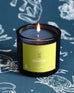 Mersea Gemini scented candle displayed on astrology sign-themed backdrop