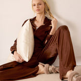 Chocolate brown button-up satin pajama set.