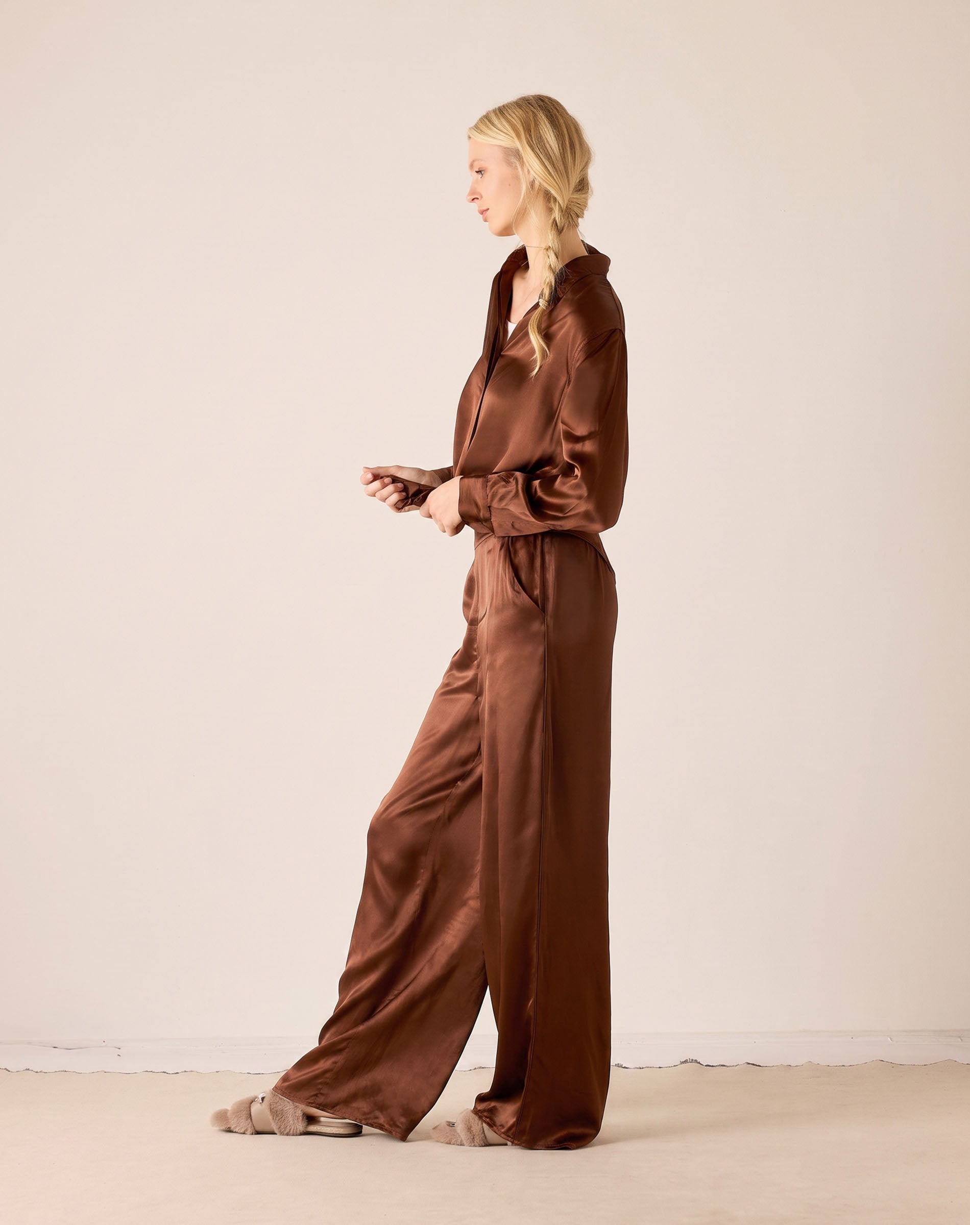 Chocolate brown silk button-up shirt and matching trousers set.