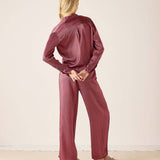 Berry-colored patterned button-up shirt with long sleeves and a relaxed fit.