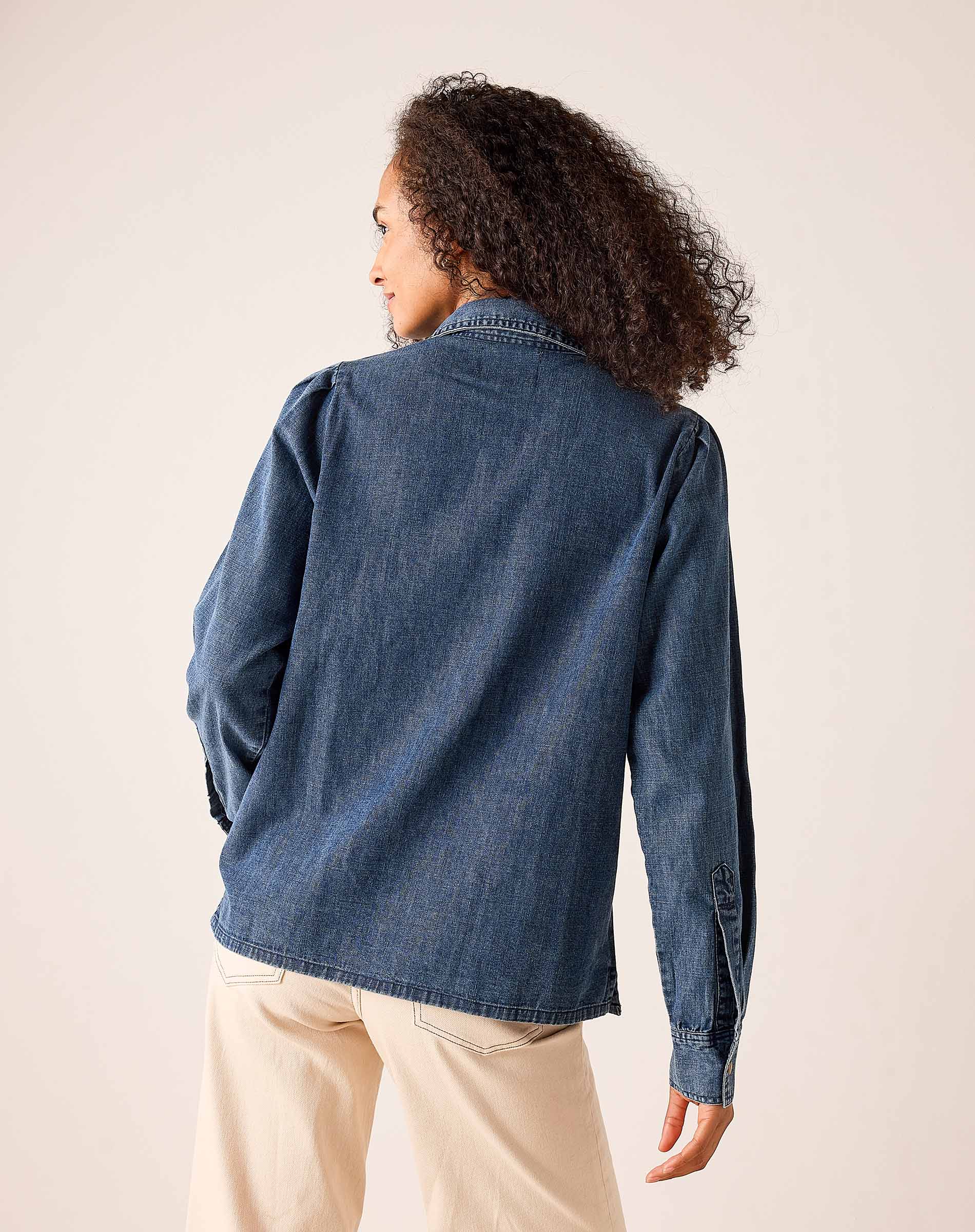 Bleu chambray button-down shirt with embroidered cuff details, back view