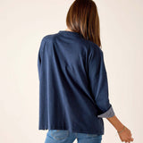 Back view of the navy chambray tee with short sleeves and a contrast cuff.