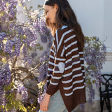 Chocolate icing brown and white striped knit sweater with wide sleeves and a textured finish.