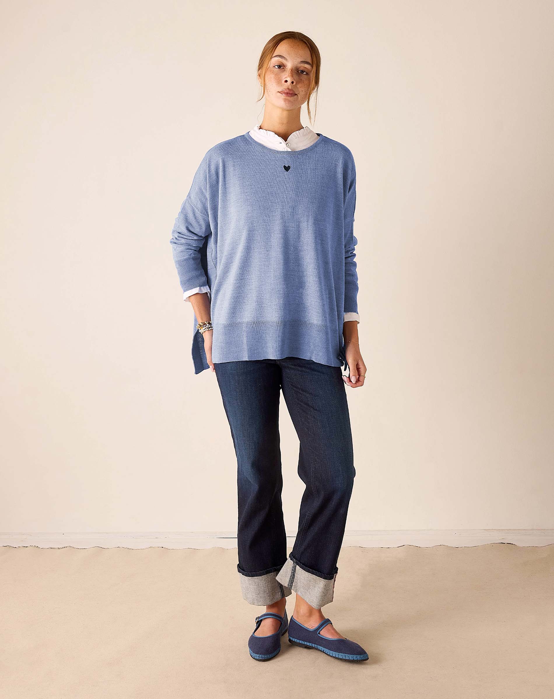 MERSEA women's travel-friendly ocean blue knit sweater with a small heart detail and long sleeves.