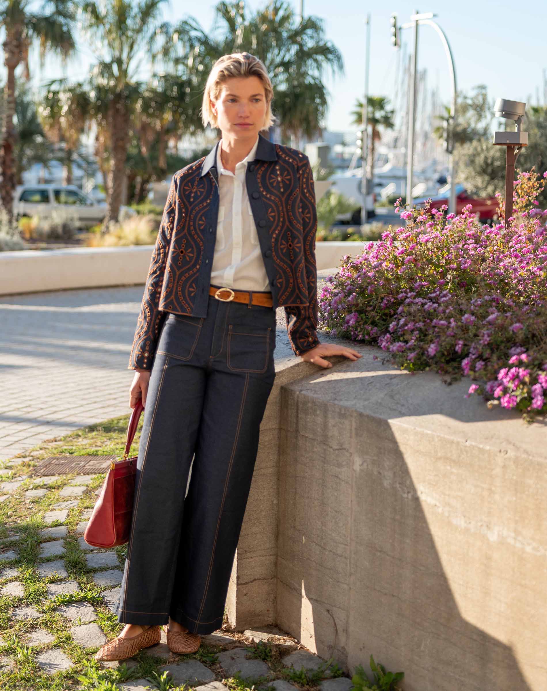 Women's travel-friendly rinse charcoal woven pants with a straight-leg fit and unique stitched detailing.