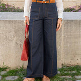 Rinse blue woven wide-leg pants with contrast stitching and front pockets.