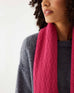closeup of woman wearing mersea rasberry apres scarf