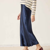 Navy blue satin-finish maxi skirt with an elegant drape.