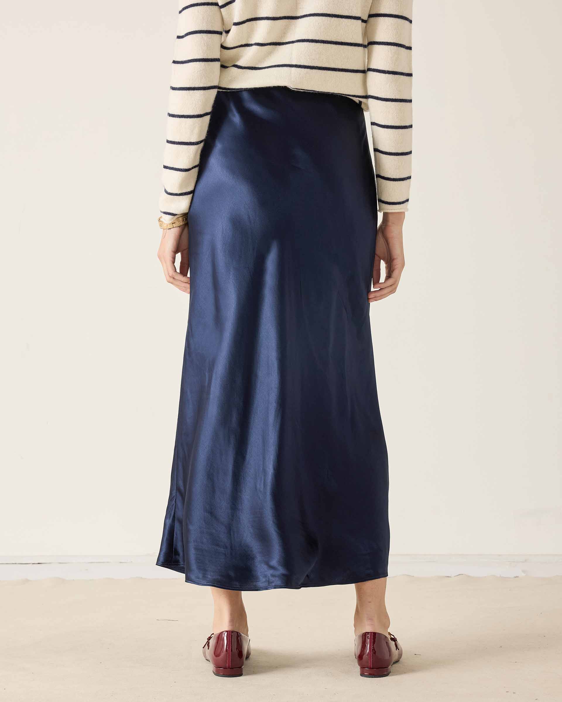 Navy blue silk satin midi skirt.