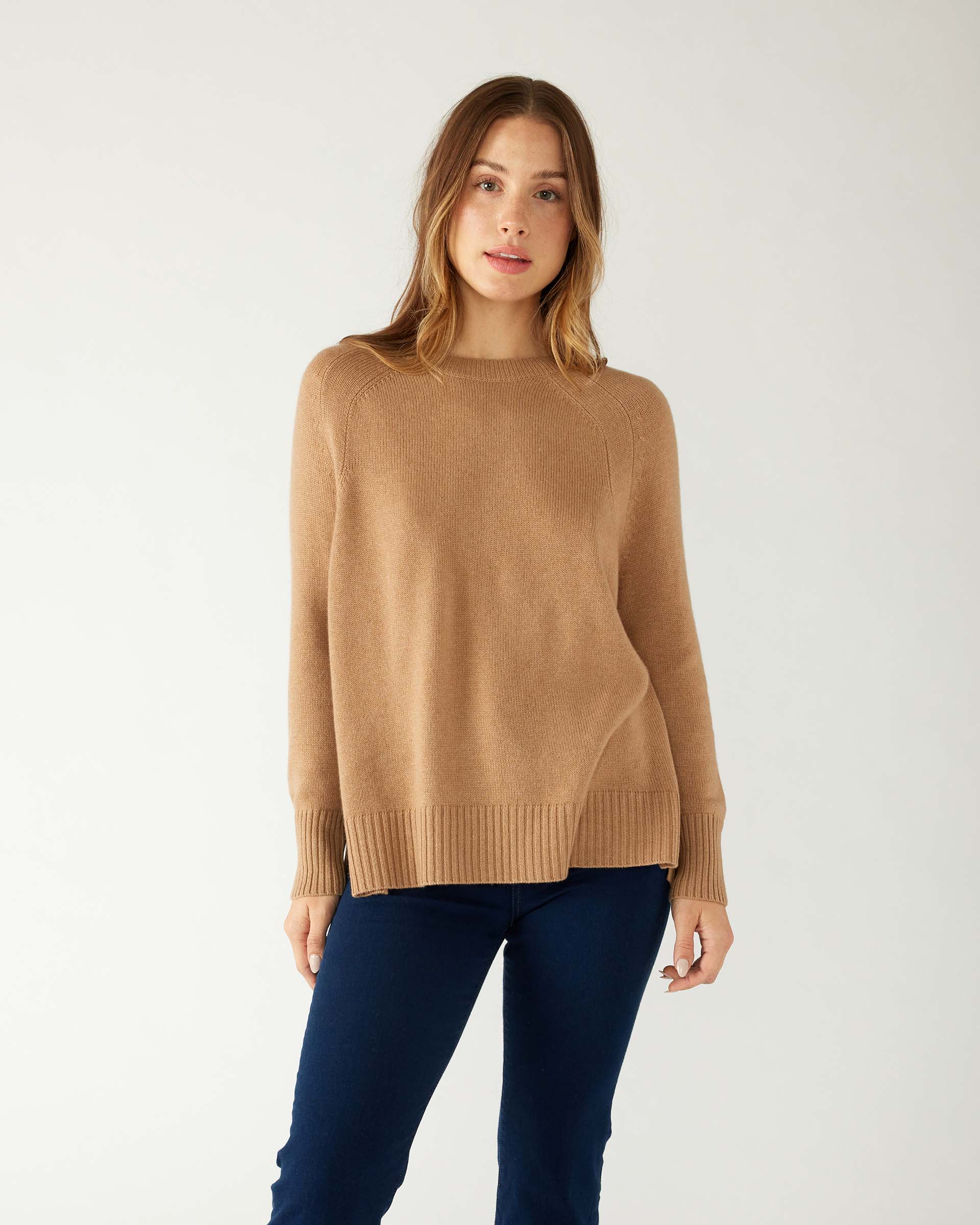 woman wearing mersea banff cashmere sweater in camel 