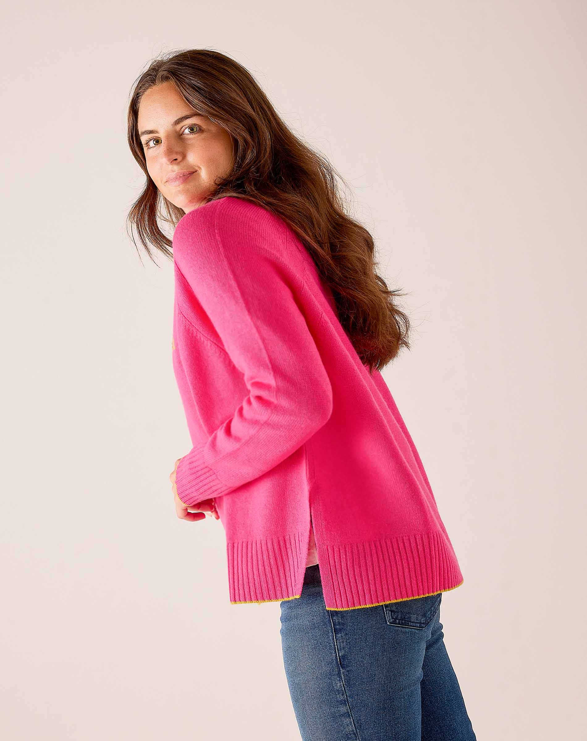 MERSEA women's travel-friendly vibrant pink relaxed-fit knit sweater with ribbed cuffs and hem.