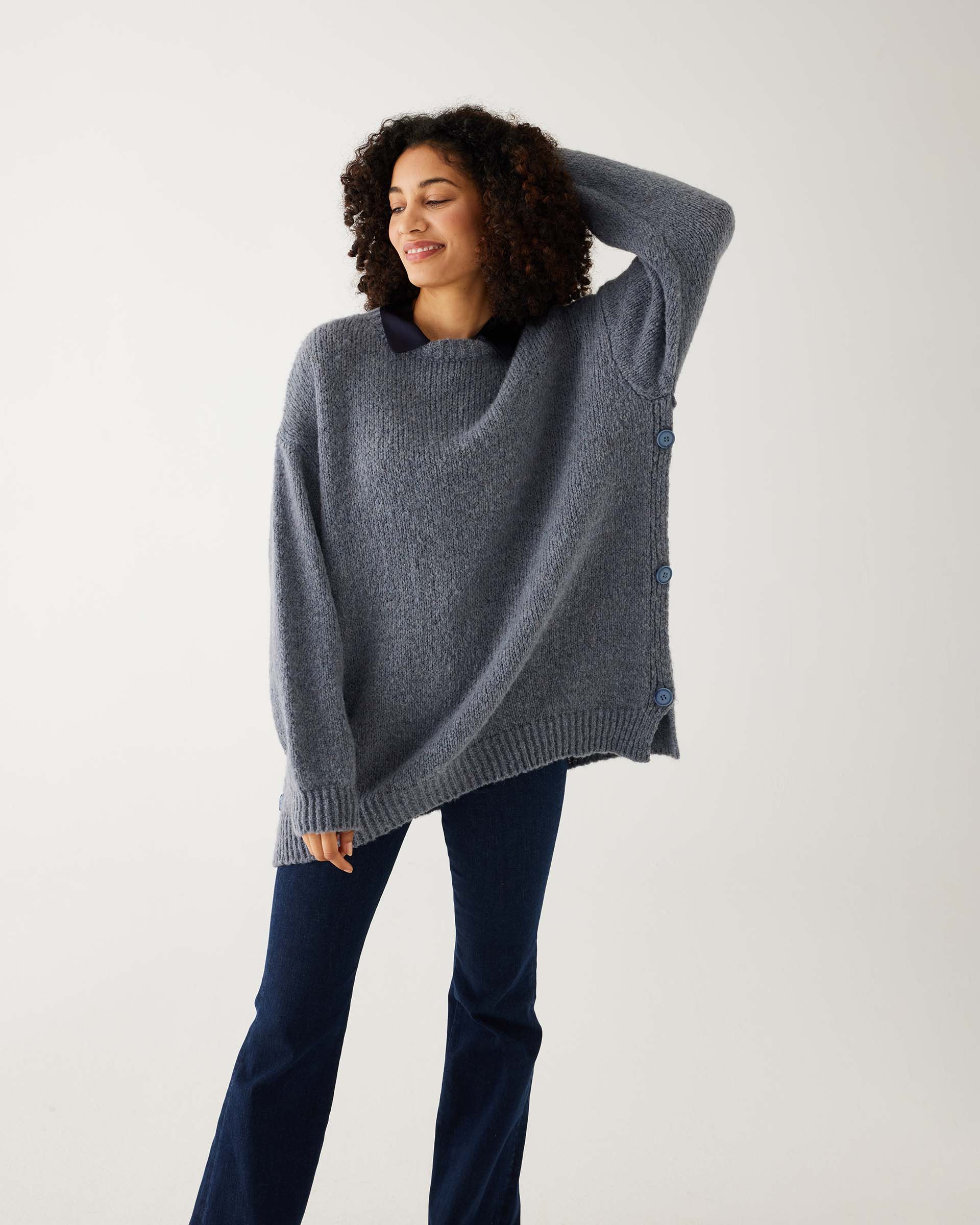 Side neck outlet button sweater