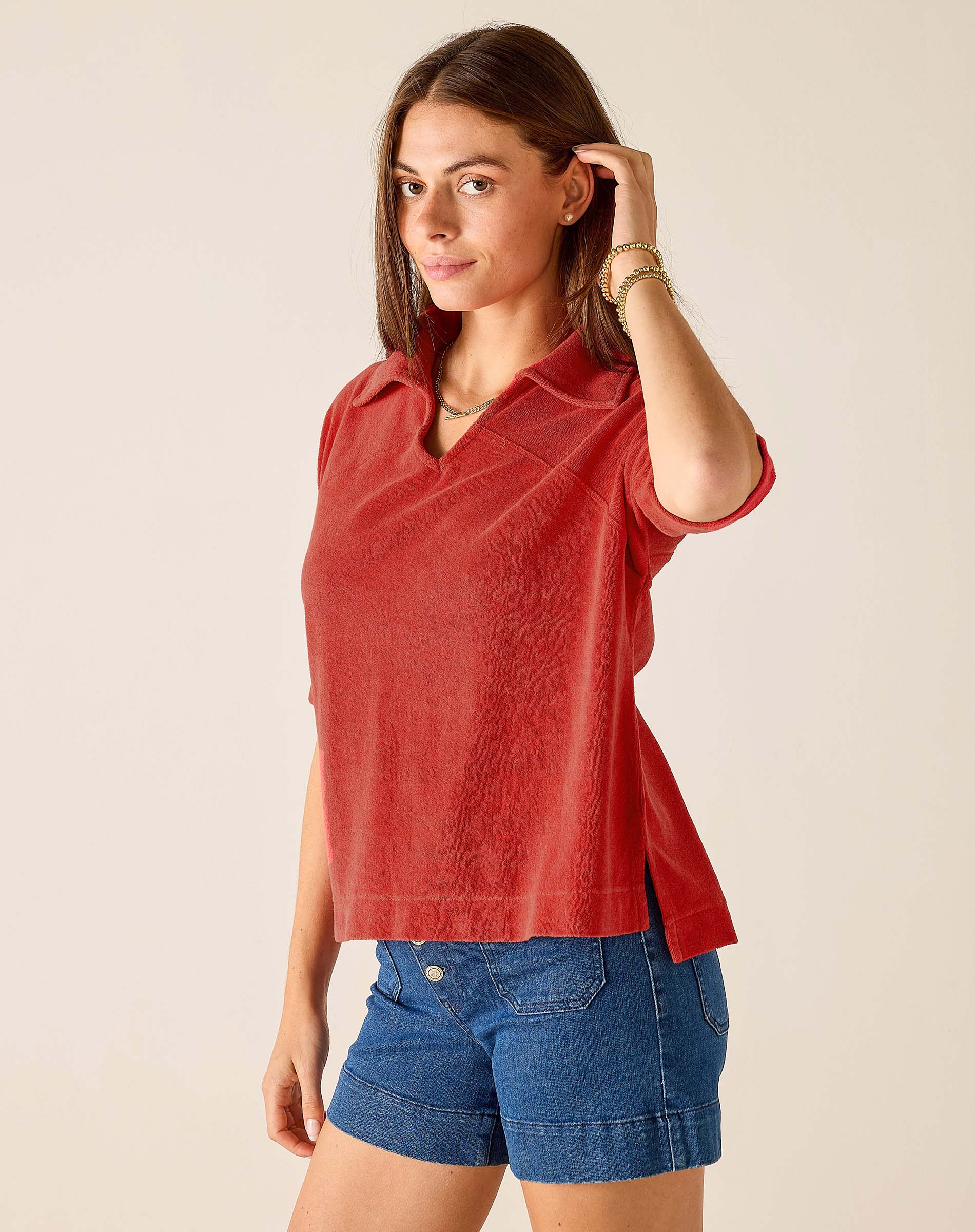 Sunbaked orange terry cloth top with a split neckline and relaxed fit.