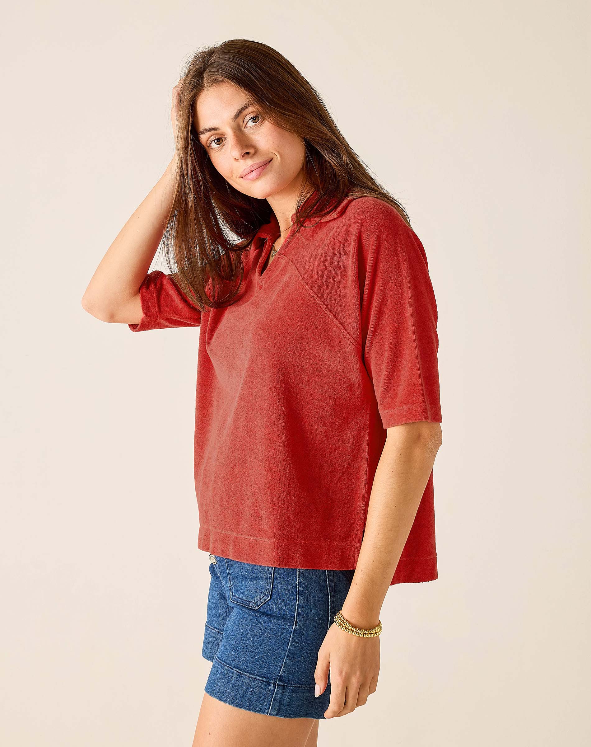 Sunbaked terracotta terrycloth top with a relaxed fit and wide neckline.