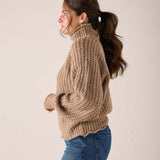 Beachstone beige chunky knit sweater with ribbed hem and oversized fit.