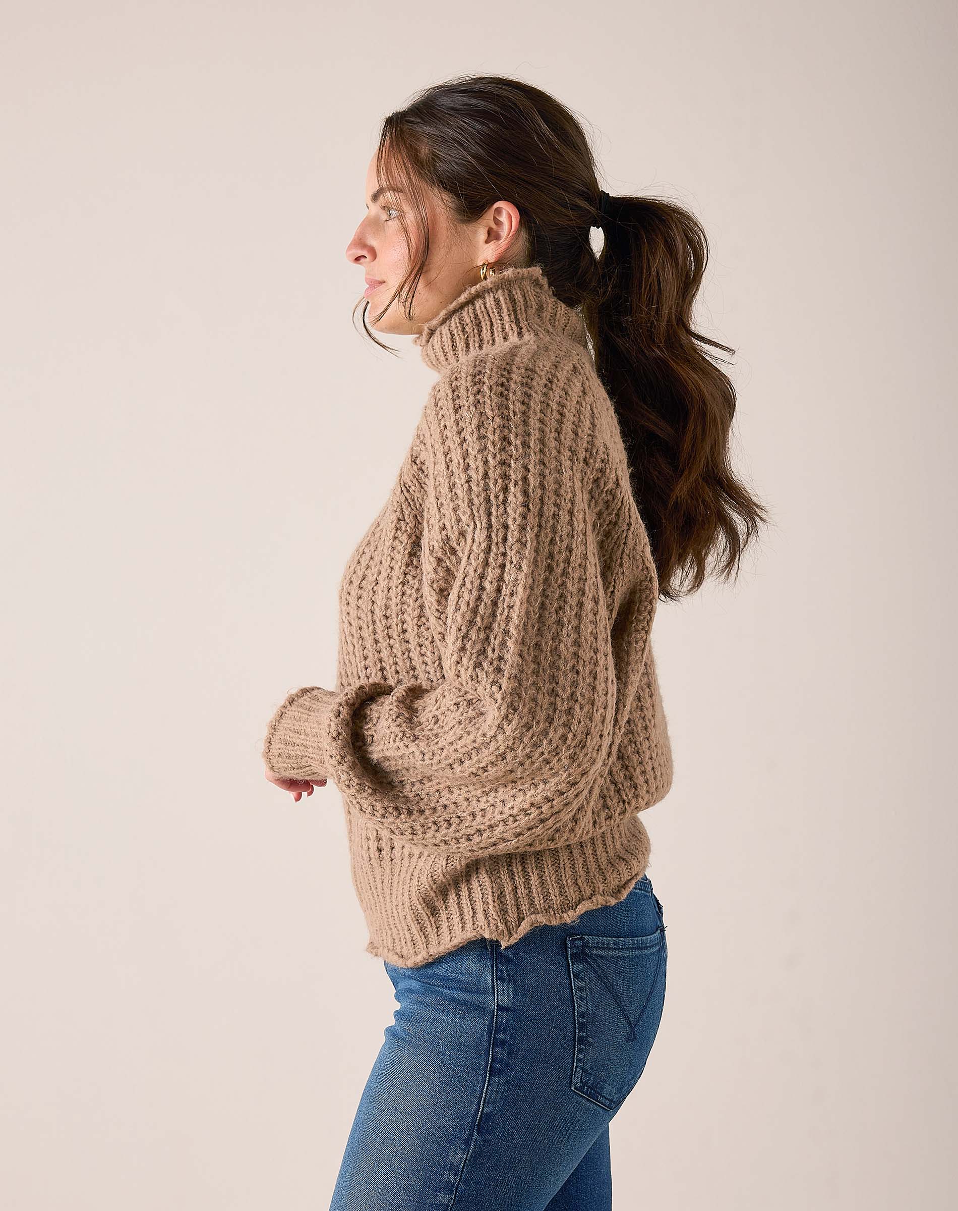 Beachstone beige chunky knit sweater with ribbed hem and oversized fit.