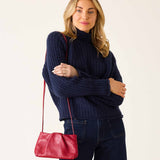 Navy blue oversized knit sweater with a high neckline and textured weave.