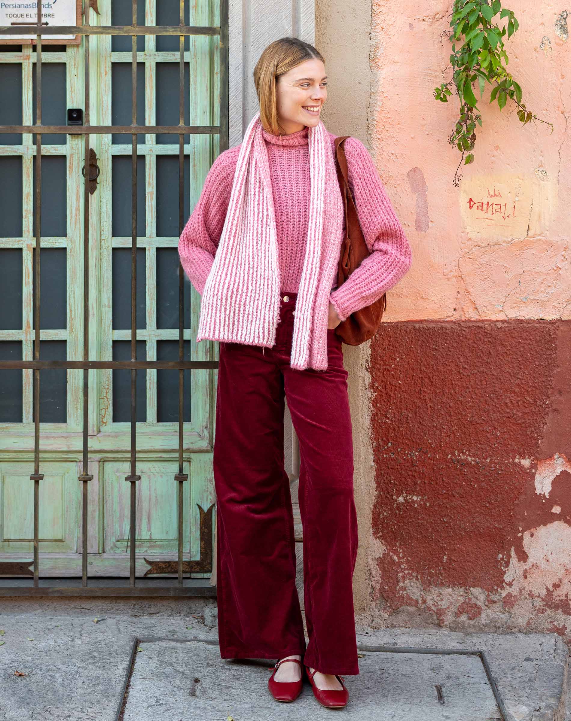 Pink sand ribbed knit sweater with a matching oversized scarf.