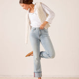 MERSEA women's travel-friendly cloud Nine light-wash blue straight-leg jeans with a unique stitched hem detail.
