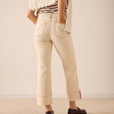 Oat colored straight leg pants in a cotton-blend fabric with stitched pocket details.